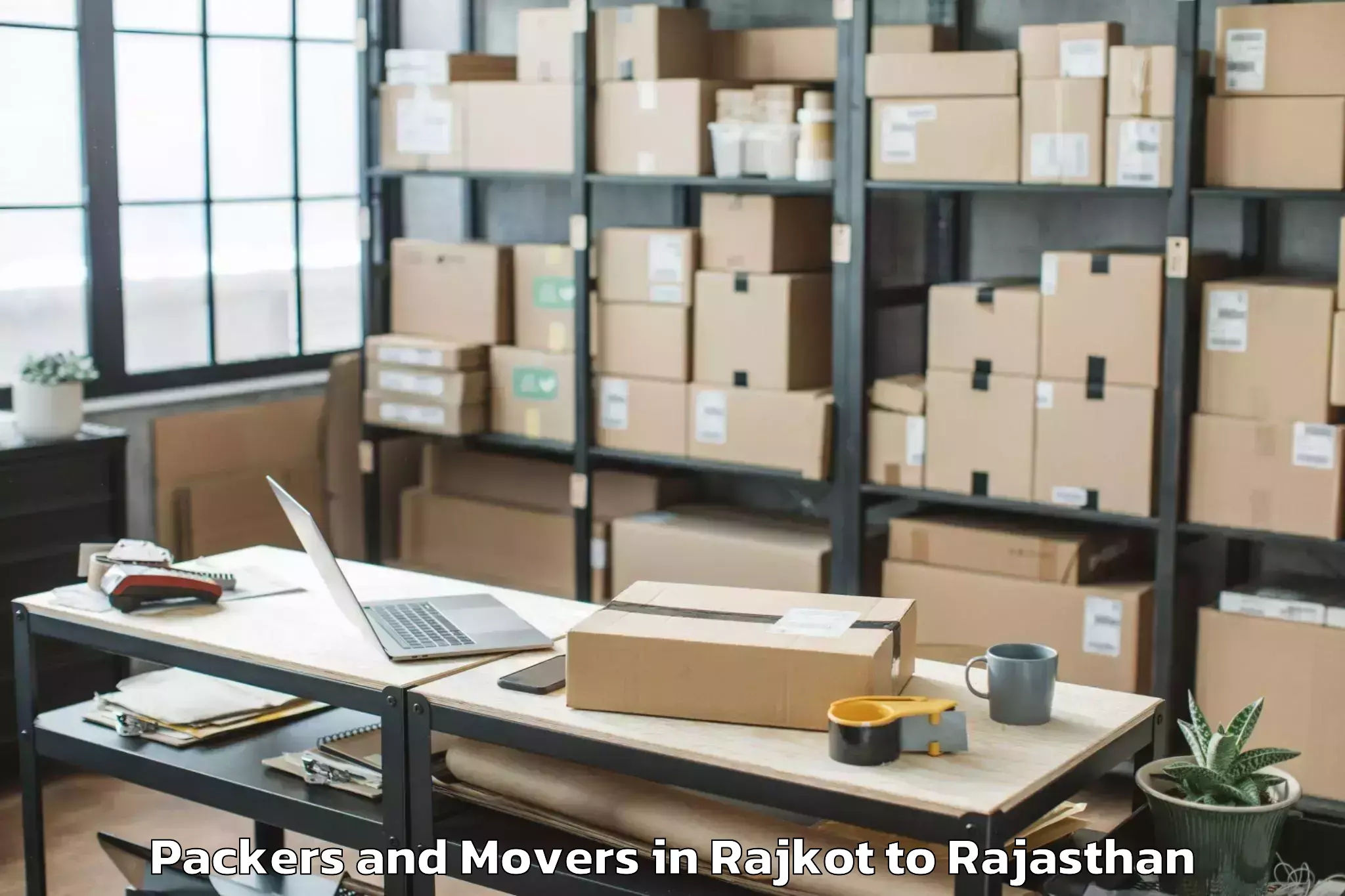 Reliable Rajkot to Opjs University Churu Packers And Movers